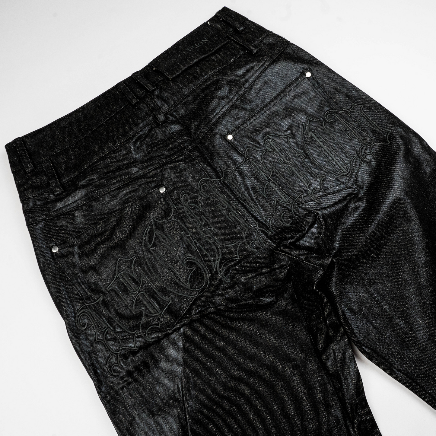 WAX DENIM PANTS